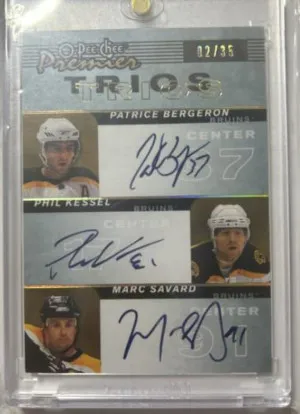 Patrice Bergeron Phil Kessel Marc Savard front