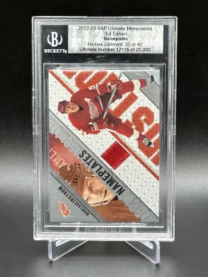 2002-03 Be A Pro Ultimate Memorabilia 3rd Edition Nicklas Lidstrom Nameplates 35 of 40 (SN#: 12115/25000) front