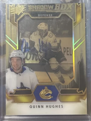 2021-22 UD SPX SHADOWBOX STARS SSP AUTO QUINN HUGHES /25 SBA-QH front