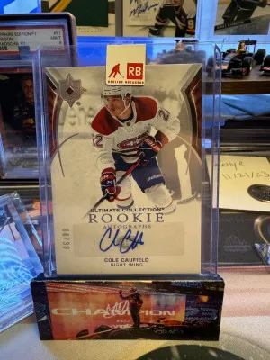 Cole Caufield Ultimate Rookie auto /99 front
