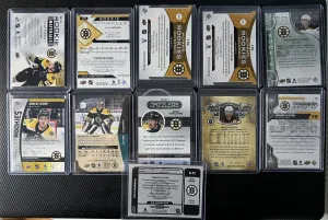 11 Card Boston Bruins Auto / Patch Lot. Brad Marchand, Jeremy Swayman and more. back