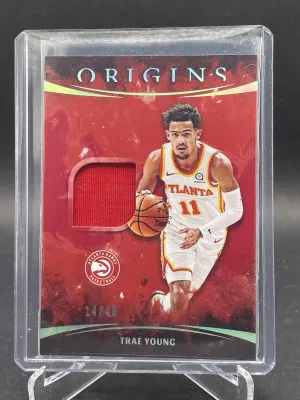 2021-22 Panini Origins Origins Memorabilia Red /49 Trae Young #OM-TYG front