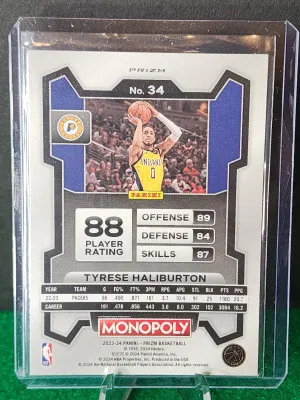 23-24 Monopoly Prizm Running man prizm Disco Sp Tyrese Haliburton back
