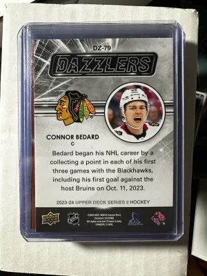 2023-24 Upper Deck Series 2 DZ79 Connor Bedard Red Dazzler Rookie RC SP BLACKHAWKS back