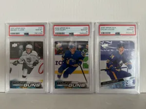 Young Guns Brandt Clarke, Dylan Cozens, Jack Quinn PSA 10 front