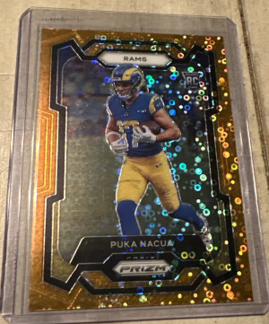 2023 Prizm Puka Nacua Rookie Orange Disco Prizm Panini Prizm front