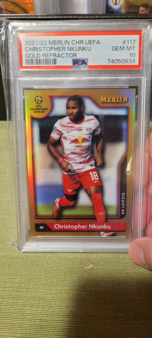 2021-22 Merlin Chrome UEFA Christopher Nkunku Gold Refractor /50 front