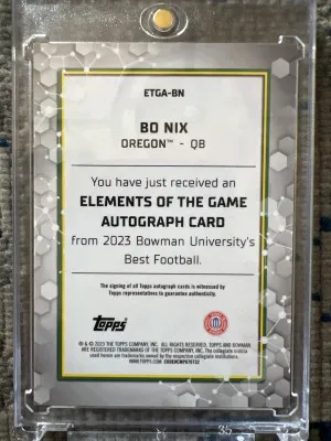 2023 Topps Elements of the Game Bo Nix Auto Gold First on Print out of 50 back