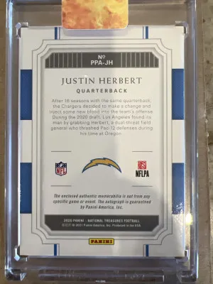 Justin Herbert National Treasures RPA /99 On Card Auto back