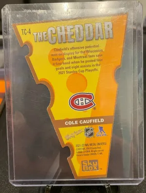 2021 Skybox Metal Universe Cole Caufield The Cheddar #TC-4 back