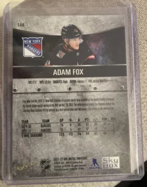 2021 Skybox Metal Universe Hockey Adam Fox #144 back