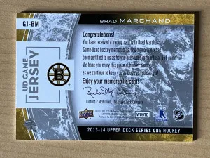 2013-14 Upper Deck UD Game Jerseys Brad Marchand #GJ-BM Memorabilia —VVCARDS— back
