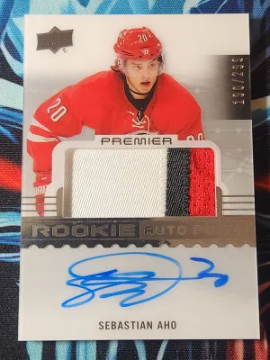 2016-17 Upper Deck Premier Rookie Auto Patch Sebastian Aho 3 Color Patch /299 front