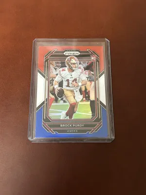 2022 Panini Prizm Red White Blue Brock Purdy  #353 (RC) front