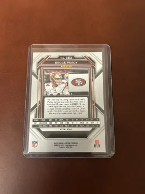 2022 Panini Prizm Red White Blue Brock Purdy  #353 (RC) back