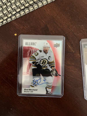 23-24 Allure Brad Marchand Red Rainbow Auto front