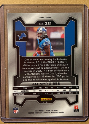 2023 Panini Prizm Jahmyr Gibbs #331 RC Orange Lazer back
