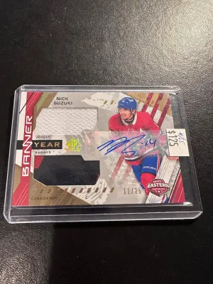 2021-22 SPGU banner year jersey & banner auto nick suzuki /25 front