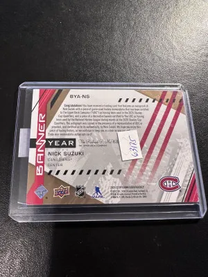 2021-22 SPGU banner year jersey & banner auto nick suzuki /25 back