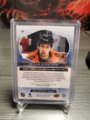 2023-24 Upper Deck Artifacts - Emerald Material #81 Dylan Guenther /65 (MEM) back