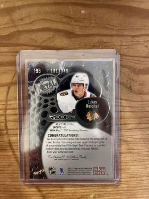 22-23 Skybox Metal Universe Lukas Reichel rookie auto 181/349 back