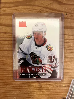 22-23 Skybox Metal Universe Lukas Reichel Premium Prospects Ruby 13/50 front