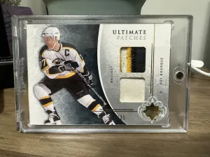 2009-10 Upper Deck Ultimate Collection - Ultimate Jerseys Patches #UJ-RB Ray Bourque /35 (MEM) front