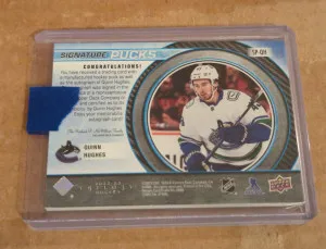 2022/23 Trilogy Quinn Hughes Signature Pucks Auto back