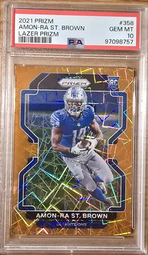 2021 Prizm Amon Ra St Brown Orange Lazer PSA 10 front