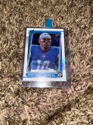 2021 Donruss Optic Amon-Ra St. Brown Rated Rookie Variation Holo PRIZM front