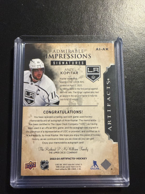 2023-24 Artifacts Admirable Impressions Signatures Anze Kopitar /24 back