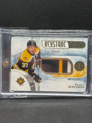 2016 Ultimate Patrice Bergeron Keystone Fabrics 3-color #/49 front