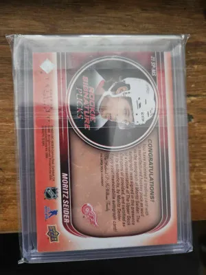 Moritz Seider 2022-23 Trilogy Rookie Signature Pucks Auto back