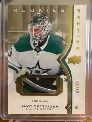 2020-21 Premier Rookie Jake Oettinger Patch /49 front