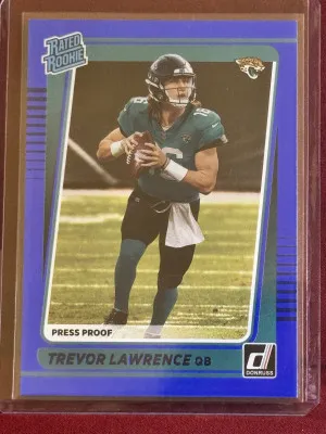 2021 Panini Donruss Trevor Lawrence #251 Rated Rookie Blue Press Proof front
