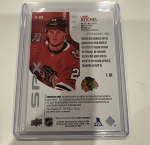 2022-23 Upper Deck SPX Lukas Reichel Blackhawks Auto 2002-03 Retro Rookies back