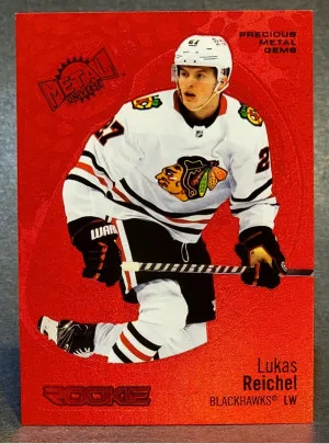 2022-23 Skybox Metal Universe  PMG  Lukas Reichel/100 front