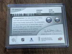 Dominik Hasek and Ryan Miller Tandem Twigs dual stick card sp game used back