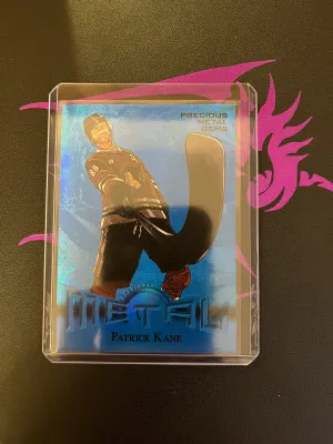 22-23 Skybox Metal Universe Patrick Kane 2012-13 retro pmg blue 26/50 front