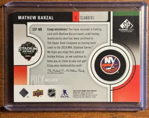 2024-25 SP Game Used Mathew Barzal Stadium Series Puck Relics #SSP-MB back