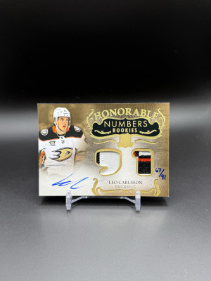2023-24 THE CUP LEO CARLSSON HONORABLE NUMBERS ROOKIE PATCH AUTO # 67/91 front