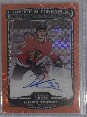 Lukas Reichel OPC Platinum Orange Checkers Rookie Auto /15 front