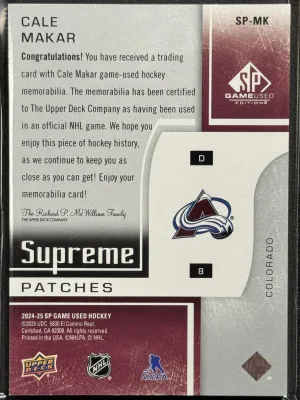 2024-25 UD SP Game Used Supreme Patches Cale Makar #SP-MK 09/15 back