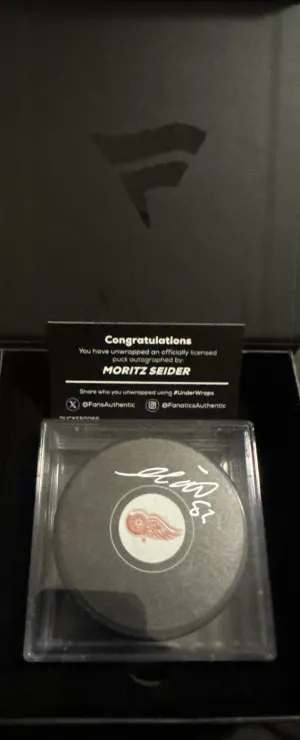 Moritz Seider Autographed Puck Fanatics UnderWraps W/COA front