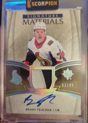 2018-19 UD Ultimate Signature Materials Brady Tkachuk 3/49 front
