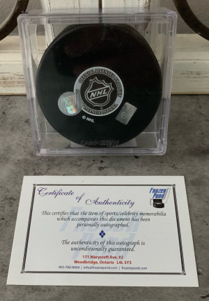 Red Berenson Autographed Puck (St. Louis Blues) - Frozen Pond COA back