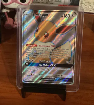 Sun And Moon Black Star Promo Eevee GX SM242 front