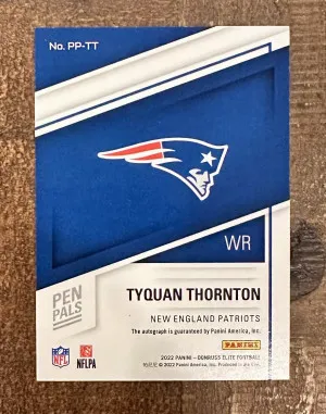 2022 Donruss Elite Tyquan Thornton Black Gold Ink Pen Pals Auto RC #PP-TT back