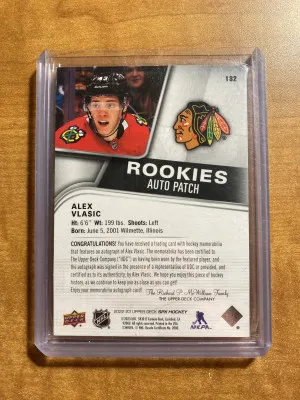 Alex Vlasic 2022-23 UD SPX Ruby Rookie Logo Patch Auto /49 Blackhawks back