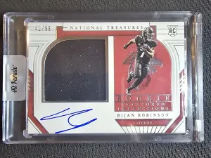2023 National Treasures Bijan Robinson RPA #/99 On Card Auto front
